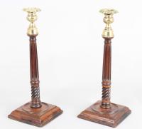 Rare pair of George III mahogany candlesticks