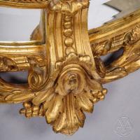 A Fine Napoleon III Carved Giltwood Oval Marginal Frame Mirror