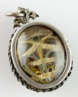 Double sided silver reliquary pendant. French, late 17th century.