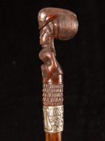 Victorian cane with a full carved wooden Lady wearing a bustle_c