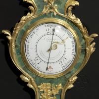 A Fine Louis XV Style Clock and Barometer Set
