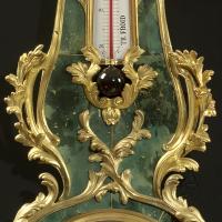 A Fine Louis XV Style Clock and Barometer Set
