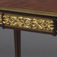 A Louis XVI Style Mahogany Centre Table by Paul Sormani