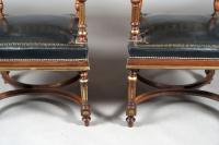 A Matched Pair of 19th Century French Brass Mounted and Leather Armchairs