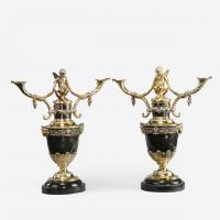 A superb pair of Victorian silver gilt candelabra