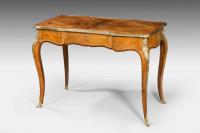 A fine mid Victorian burr walnut writing table