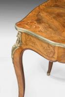 A fine mid Victorian burr walnut writing table