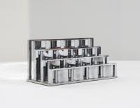 Letter rack by Jacques Adnet