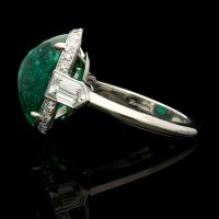 8.59ct Sugarloaf cabochon Colombian emerald ring with diamond halo set in platinum