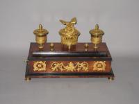 AN EMPIRE PERIOD ROSEWOOD & ORMOLU MOUNTED INK STAND. FRENCH, CIRCA 1825