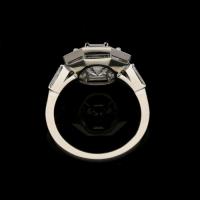 3.02ct Vintage octagonal step-cut diamond ring with geometric diamond surround in platinum
