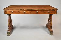 A fine Regency rosewood lyre ended writing table, c.1810.
