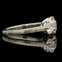2.62ct diamond three stone ring set in finely hand engraved platinum