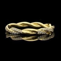 A beautiful 18ct yellow gold fine twist ring fully set with round brilliant cut diamonds