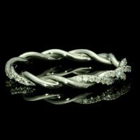 A beautiful platinum fine twist ring fully set with round brilliant cut diamonds