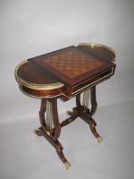 A FINE ROSEWOOD READING/WRITING & GAMES TABLE GEORGE IV, CIRCA 1825