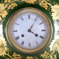 A late 19th century tôle wall clock