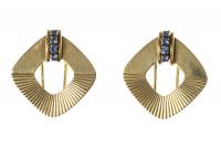 Vintage Tiffany A Pair of Clip Brooches in 14 Karat Gold with Sapphires, New York circa 1950.