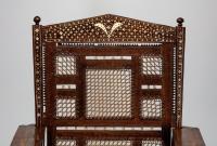 An Ivory-and-Bone-Inlaid African Ebony Lamu Chair (Kita Chaenzi - Chair Of Power)