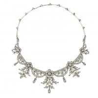 A late Victorian diamond-set tiara of floral design, consisting of five diamond-set flowers