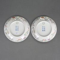 A pair of Chinese imperial porcelain famille rose enamelled fencai saucer dishes, 1862-1874
