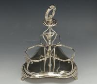 Emes and Barnard decanters in silver frame