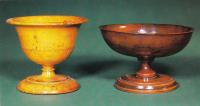 Two footed dishes that could have been used for sweetmeats. The darker one has a wide shallow bowl on a pedestal stem and dates from c. 1750