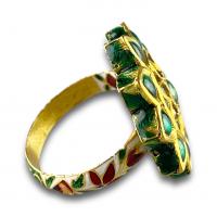 A foiled emerald, paste & enamel ring. Indian, early 20th century