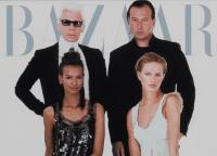 Cover photo of Karl Lagerfeld with models for Bazaar magazine