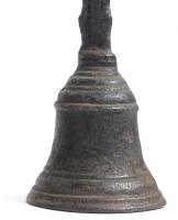 A 19th century cast iron doorstop in the form of a bell
