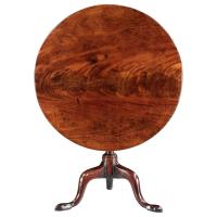 A mid-18th century mahogany tripod table