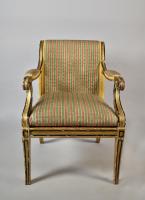 A Regency gilt and black armchair in the Southill manner, c.1800.