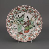 A Chinese porcelain famille verte moulded dish, Kangxi, 1662-1722