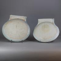 Reverse of pair of Kangxi rouge-de-fer dishes