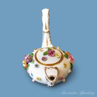 A Small Meissen Teapot With Long Handle