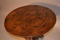 An early 18th century oak pedestal table