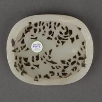 A Chinese pale celadon jade openwork plaque, Early Ming dynasty