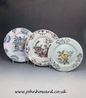 Three English delftware plates 18th century