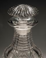 A Suite of Irish Regency Decanters and Goblets