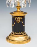A Fine Pair of George III Candlesticks