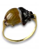Gold ring set with a banded agate scarab amulet. French, 20th century