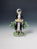 Staffordshire pearlware pottery bocage figure of Dr Syntax Landing at Calais
