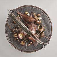 An elaborate Japanese, Meiji-era bronze and multi-metal basket of seafood Signed Joun