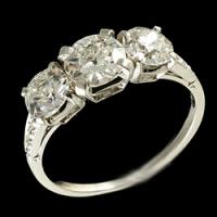Platinum set three stone diamond ring