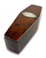 Oak box in the form of a coffin. English, mid 19th century