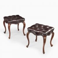 A pair of mid-Victorian rosewood stools