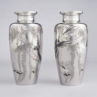 Japanese pair of silver vases with birds, signed Isshinsai Yoshihisa koku with seal of the Shobido Studio and Jungin mark, Meiji Period.