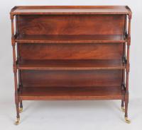 Fine George III mahogany and boxwood strung four tier open shelves
