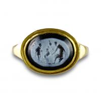Ring set with a Roman Nicolo intaglio. 2nd century A.D, later gold ring