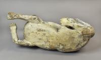 A rare carved wood model of a dog, probably a Talbot hound with the remains of the original painted decoration, c.1800
